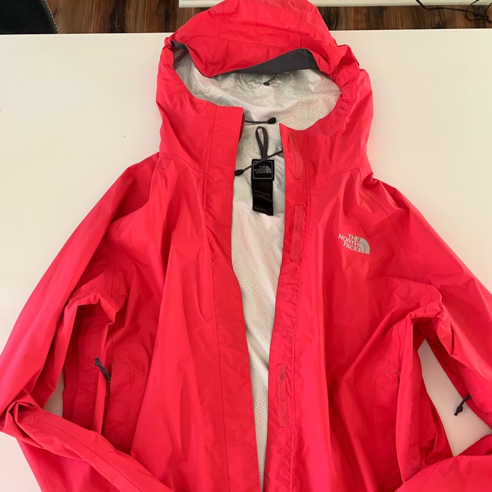 The North Face Rain jacket (with hood)